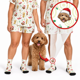 A person and a dog wearing matching Christmas-themed pajama set with a dog print, shown on a white background with zoomed-in detail circles highlighting the shirt and socks.