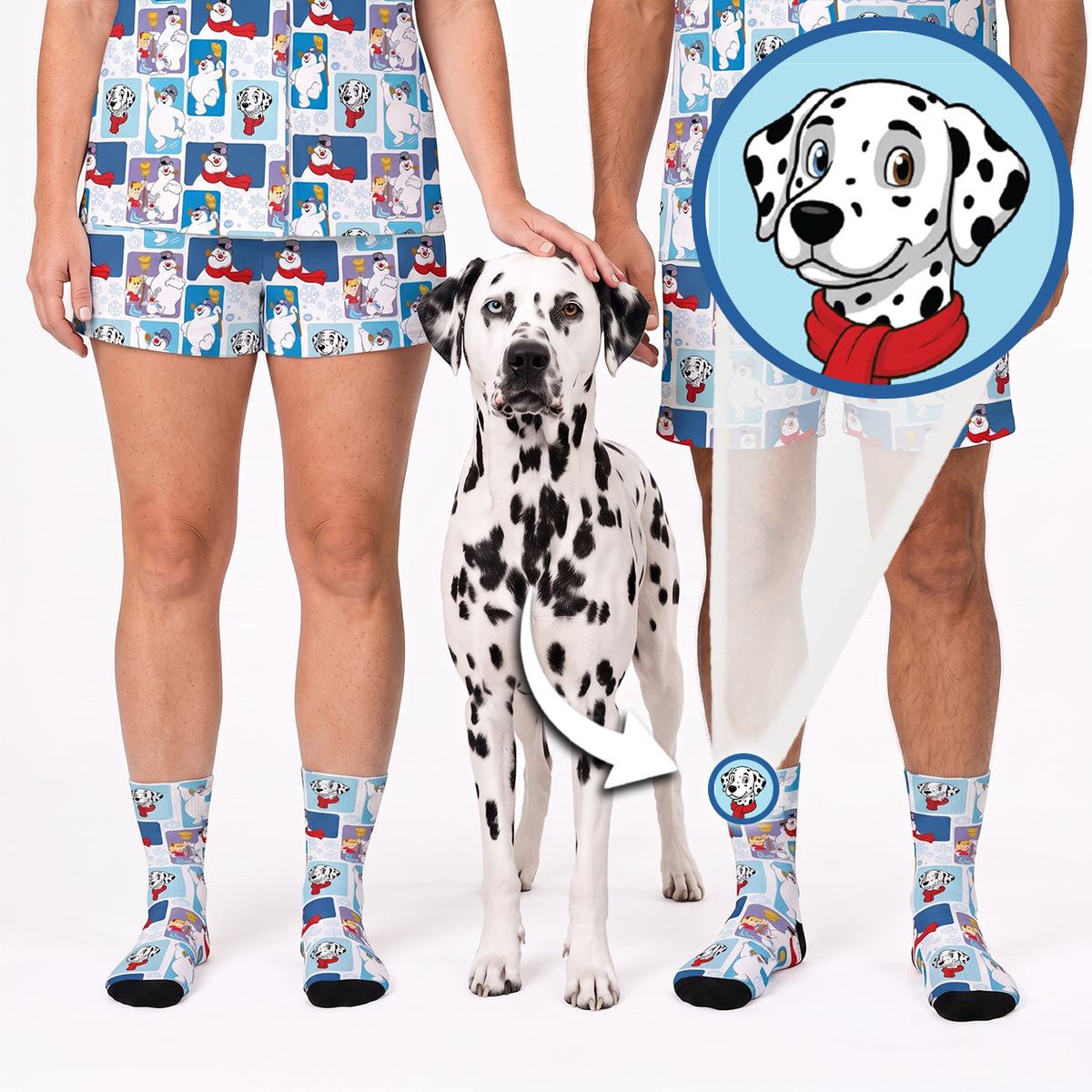 A Dalmatian dog stands between two cropped human legs wearing matching patterned socks and shorts, with a circular cartoon Dalmatian face graphic and arrow showing the print detail. The product appears to be the socks and matching shorts featuring a blue-and-white cartoon dog print with black spots.