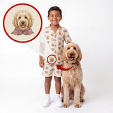 A child wearing a matching beige pajama set with a dog print stands next to a golden doodoodle dog wearing a matching collar. A circular inset at the top left shows a cartoon illustration of the dog portrait, with arrows pointing to the child's and dog's respective printed areas on the clothing.