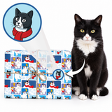 A black-and-white cat sits beside a wrapped gift box on a white background. The gift is wrapped in blue holiday-themed paper with repeated cartoon cat and snowman motifs, plus a small bow.