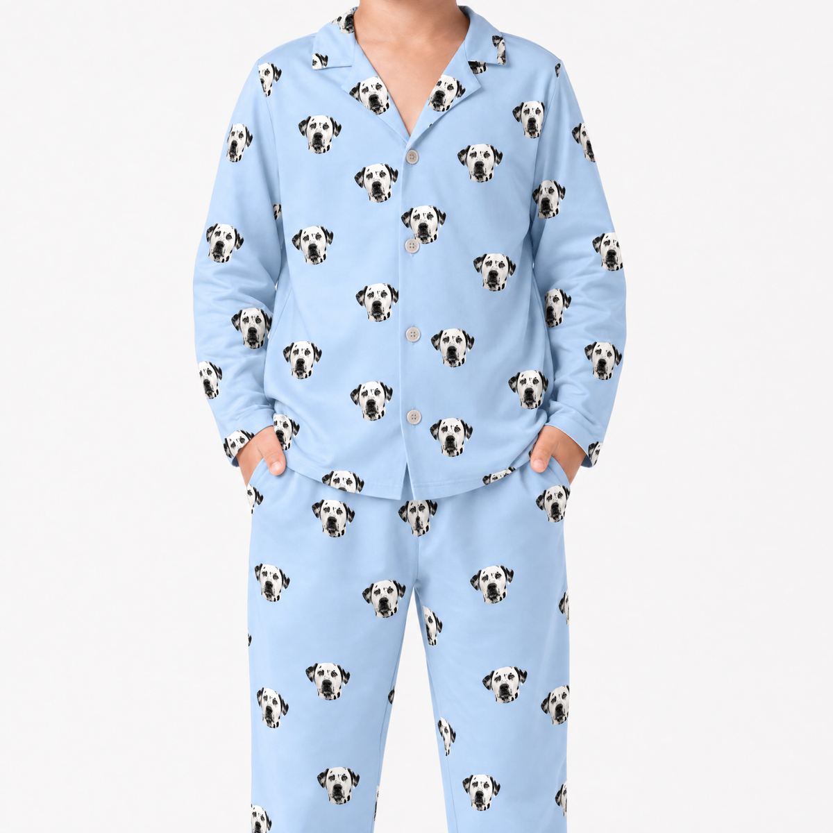 Sky blue pajama set with dalmatian dog pattern on a white background