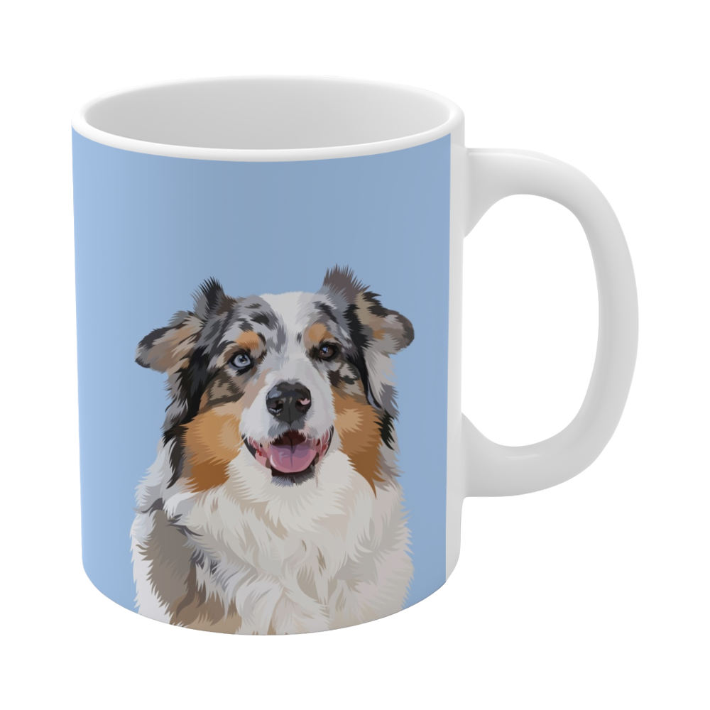 A clean product shot of a blue ceramic mug featuring a smiling, multicolored Australian Shepherd
