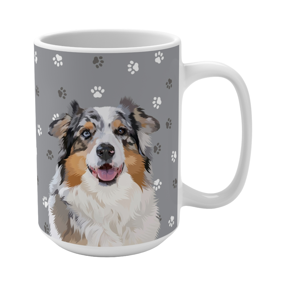 Close up of gray ceramic mug with paws pattern, featuring a smiling, multicolored Australian Shepherd
