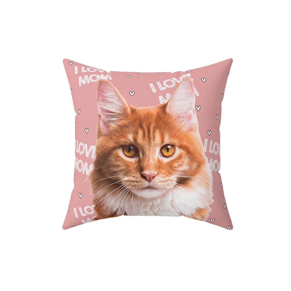 Pink pillow with hearts and the phrase "I love mom", it features a portrait of a cat. 