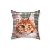 Pillow with a plaid pattern and a cat illustration on a white background