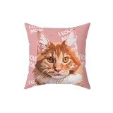 Pink pillow with hearts and the phrase "I love mom", it features an illustration of a cat. 