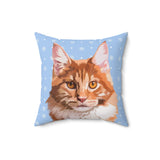 Pillow with a cat illustration on a blue background with snowflakes