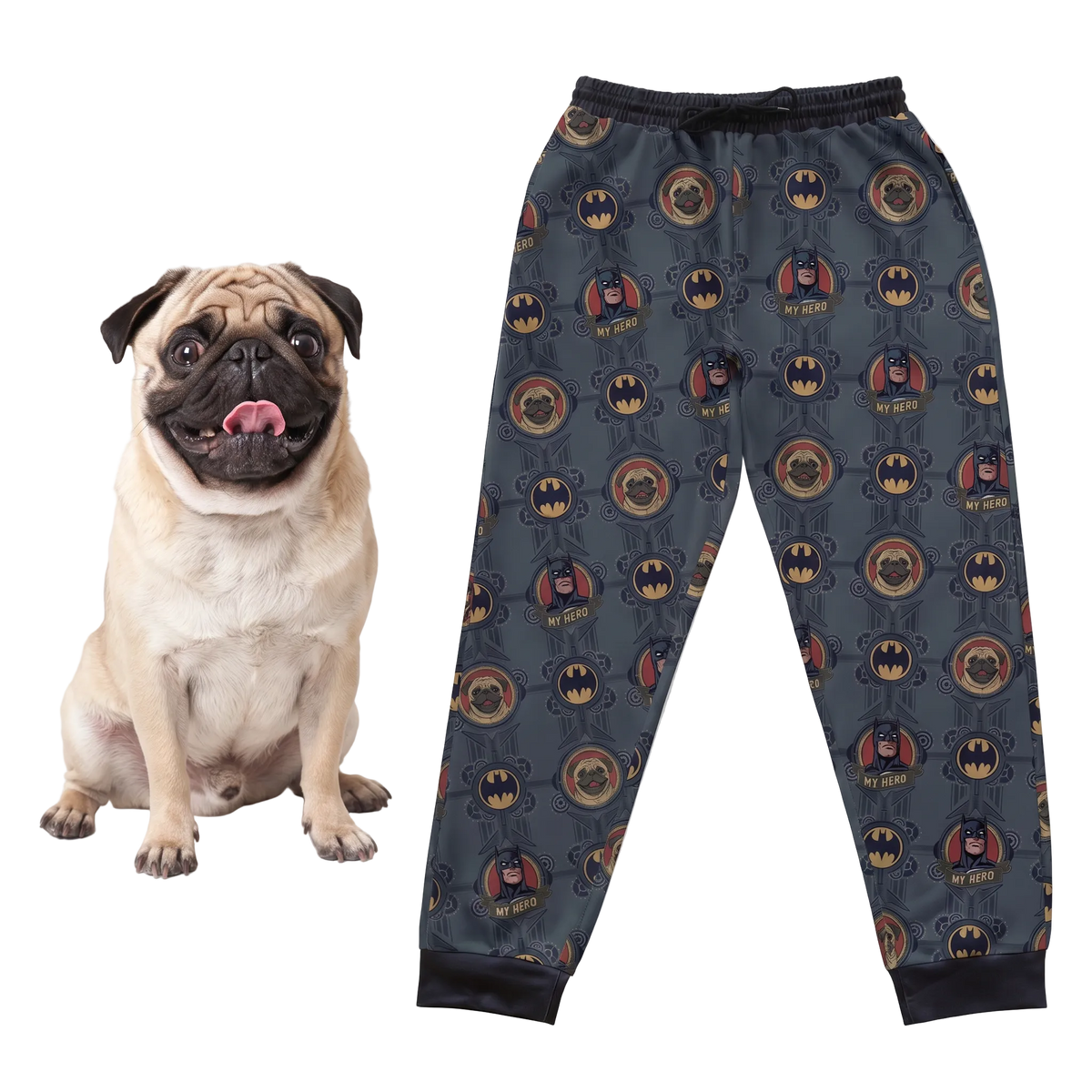 Pug sitting next to a sweatpants with a batman pattern on a white background