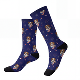 Pair of blue socks with dog pattern on a white background[Fireworks]