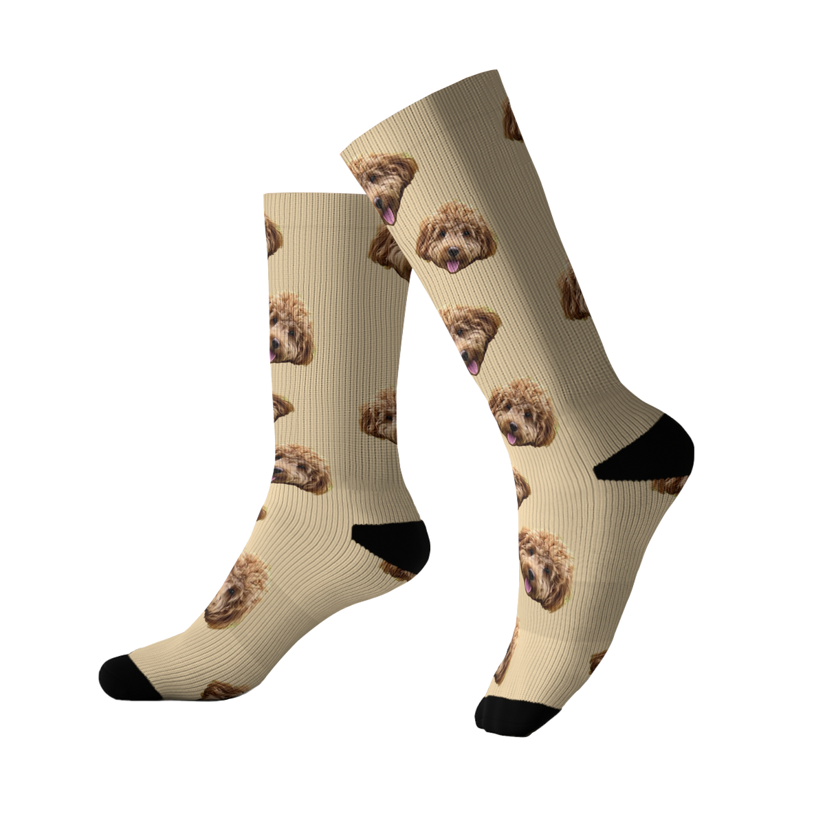 Beige socks featuring a repeating pattern of a fluffy brown dog’s face. The socks have black toes and heels and are shown worn by a person standing with one foot slightly forward.