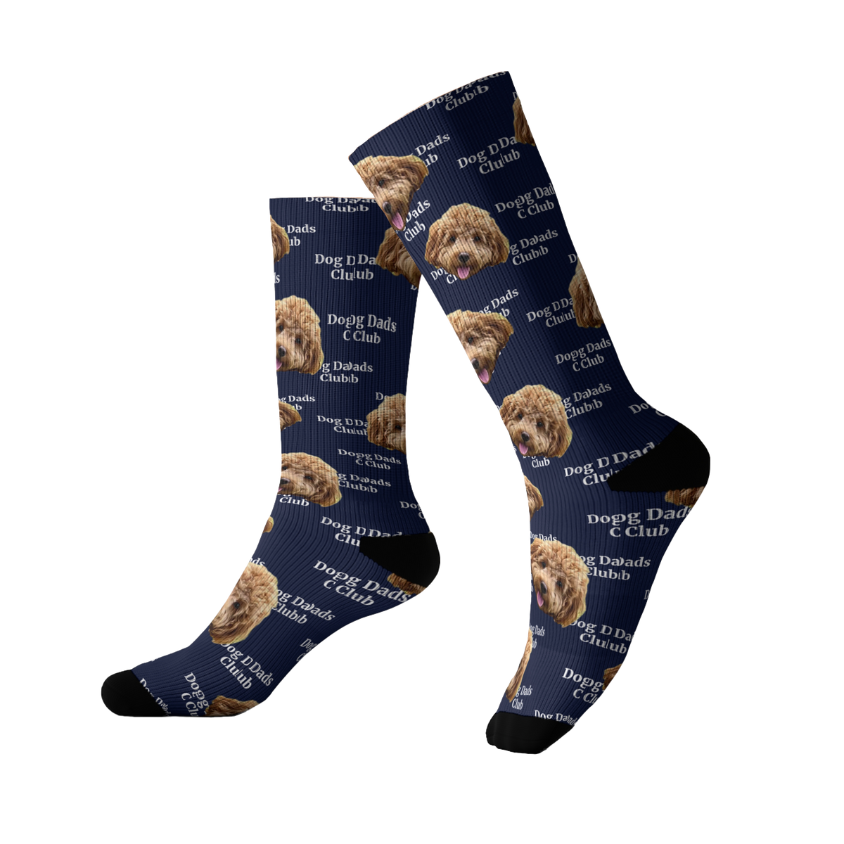 Navy blue socks featuring a repeating pattern of a fluffy brown dog’s face along with the phrase “Dog Dads Club” scattered throughout the design. The socks have black toes and heels.