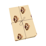 Butter yellow pet wrapping paper with dog portraits and a golden ribbon design.
