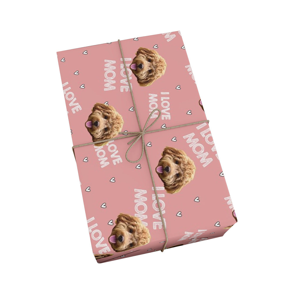 Pink wrapping paper with hearts, "I love mom" phrases and dogs