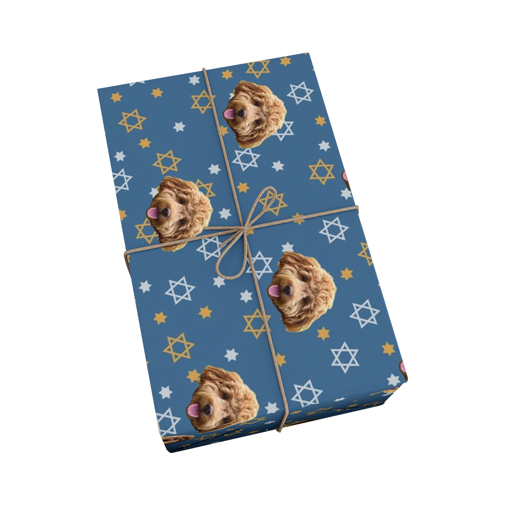 Gift wrap with dog pattern and star designs on a blue background